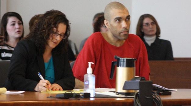 William L. Phillip Jr. listens to Judge Andrea Darvas during his sentencing Friday in Kent for the first-degree murder of Seth Frankel in 2010. Darvas gave Phillip a 25-year prison sentence. Defense attorney Kristen Murray is on the left.