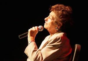 Holocaust survivor Gerda Weissmann Klein speaks Monday to students and adults at Kent-Meridian High School. She was a guest speaker at the school district’s Holocaust Survivors’ Symposium.