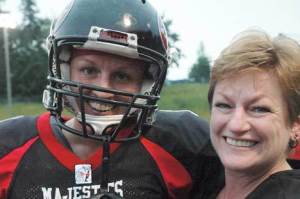 Crystal 'Airforce' Sanderson of the Seattle Majestics shares a smile June 6 with her mom