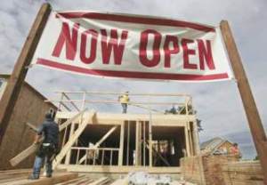 Workers build homes at The Ridge at Panther Lake