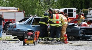 The Kent Fire Department sets up an accident scene as part of its annual Gift of Life presentations to high school students.