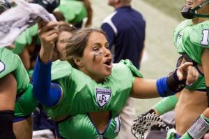 Seattle Mist quarterback KK Matheny celebrates a 64-19 win over the Las Vegas Sin in a Legends Football League game on Saturday night at the ShoWare Center in Kent.