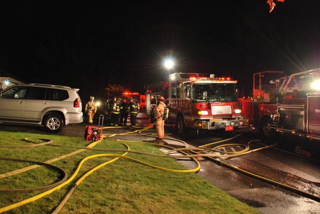 Kent Fire Department Regional Fire Authority at a house fire in the 21800 block of 102 Pl. SE of Kent