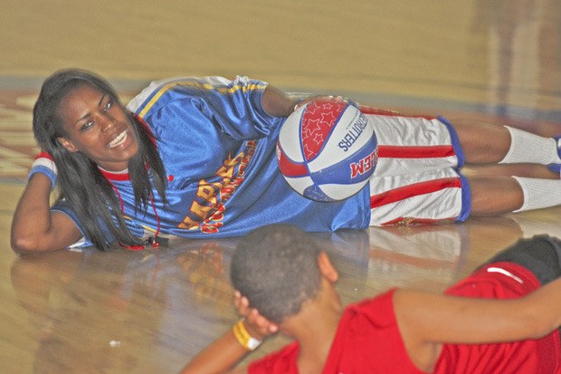 Fatima 'TNT' Maddox leads a drill in dribbling.
