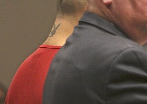 Nicolas Moreno pleads not guilty Thursday in Kent to three counts of first-degree assault for firing shots that injured people July 23 at a Kent car show. Judge Mary Roberts banned the media from shooting the faces of the six men charged in connection with the shootings.