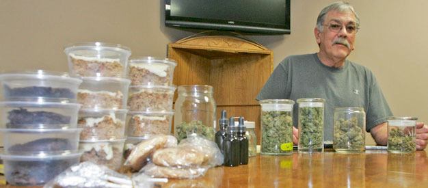 Charles Lambert has closed Evergreen Association of Collective Gardens in Kent after receiving a letter from the federal Drug Enforcement Administration threatening to close the medical marijuana dispensary.