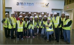Kent city and Kent School District representatives toured Amazon’s new fulfillment center in Kent on Monday. The tour was led by Melissa Nick