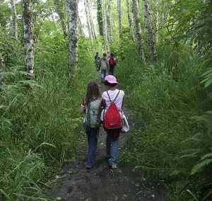 Children hike through the woods at Lewis and Clark National Historical Park in Astoria