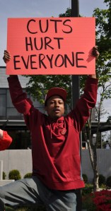 Green River College student Keith Beasley takes part in a protest earlier this year over the proposed program cuts.