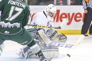 Thunderbirds goalie Landon Bow prepares to cover up the puck during a game against Everett earlier this month. Bow has six wins