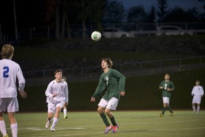 Paul DeLean goes for a header in Kentridge’s soccer match May 1 against Tahoma. Kentridge lost  to the Bears 1-0.