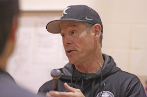 Kentwood coach Mark Zender talks to his players at batting practice on Monday afternoon. The Conquerors are preparing to face Walla Walla in a state Class 4A opener Saturday in Puyallup.