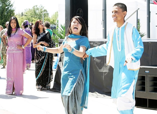 Colorful outfits are part of the Kent International Festival as seen at the 2010 event. Participants must sign up by April 30 to be part of this year's event June 18.