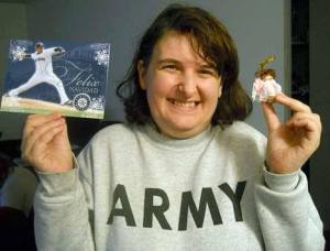 Veteran Pamala Heydt is all smiles as she shows some of the Christmas cards and ornaments that came in for her card-campaign Operation Christmas Love. With friends