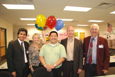 Jay Maebori (center) is the Puget Sound Educational Service District Regional Teacher of The Year. Maebori is a Kentwood High School language arts teacher. Superintendent Edward Lee Vargas (left)
