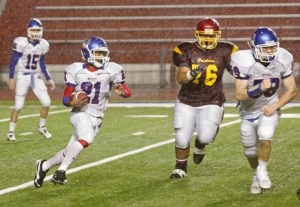 Kent-Meridian running back B.J. Arceneaux (21) supplied the Royals with their biggest highlight Friday night