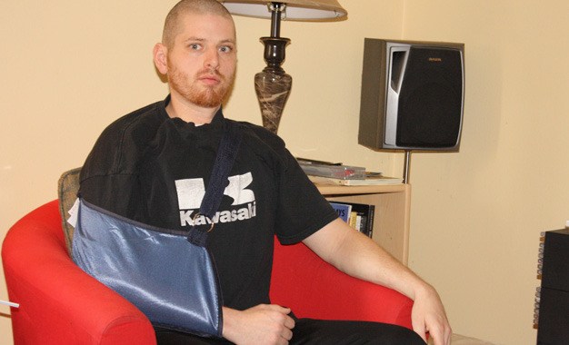 Justin Stucky still faces months of recovery after a tree struck him in Kent during the Jan. 19 ice storm as he walked to work.