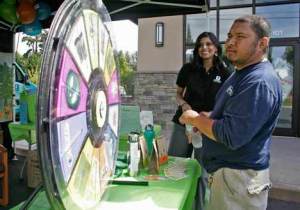 Dominic Yusim wins a free lunch Aug. 20 from Umpqua Bank Associate Sandip Sall