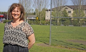 Going green: Page Meyer stands in front of the 15