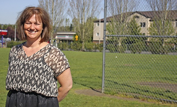 Going green: Page Meyer stands in front of the 15