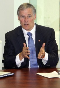 Gov. Jay Inslee talks to members of Sound Publishing at an editorial board meeting Friday in Bellevue.