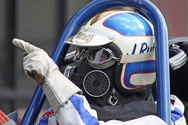 Jerry 'The King' Ruth points to one of his crew members as he revs up his restored 1969 Top Fuel dragster.