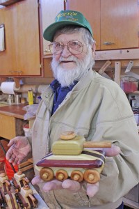 Vern Heinle of Kent carves wooden toys and distributes them to children in need.