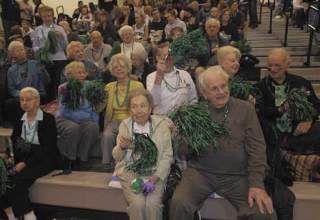 More than 20 senior citizens from Renton’s Chateau at Valley Center retirement community came to see Kentwood standout Lindsey Moore Friday night. Moore