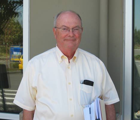 Kent resident Denton Hanford says city officials are 'unrealistic' in their projections of an increase in sale tax revenue in the second half of this year.