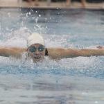 Kentridge High School senior Haley Childress swims her way to a second consecutive 4A West Central District title in the 100-yard butterfly. Childress&rsquo; victory in the event helped lead her team to a second-place finish in the meet last Saturday. COURTESY PHOTO, TRACY ARNOLD