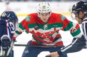 The Thunderbirds' Mathew Barzal anticipates the drop of the puck for a face-off during WHL play Saturday night at the ShoWare Center. The T-Birds were sporting throwback Seattle Metropolitans jerseys in celebration of 100 years of hockey in Seattle. COURTESY PHOTO