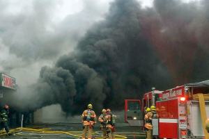 Woman pleads not guilty to arson in Kent strip-mall fire