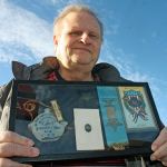 Kent&rsquo;s Jim Dimond, a historian, holds a collection of mementos from Civil War veterans. Dimond ensures lost or forgotten Civil War veterans are recognized. MARK KLAAS, Kent Reporter