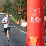Auburn&rsquo;s James Roach scoots to victory in the 34th annual Christmas Rush Fun Run/Walk on Saturday at Hogan Park at Russell Road. Roach, 31, defended his race title with a time of 34 minutes, 13 seconds. MARK KLAAS, Kent Reporter