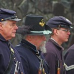 Civil War re-enactors stand at attention at the ceremony. MARK KLAAS, Kent Reporter