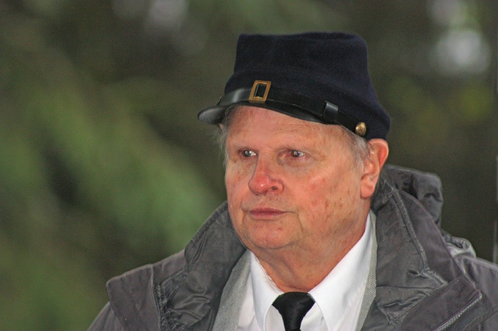 Kent&rsquo;s Jim Dimond, Civil War historian and family history researcher, looks on during the ceremony. MARK KLAAS, Kent Reporter