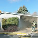 Firefighters battle Kent mobile home fire | Update
