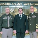 King County Sheriff&rsquo;s Office Capt. Greg Thomas, Council Vice Chair Reagan Dunn and Sheriff John Urquhart at the unveiling of the memorial for deputies killed in the line of duty.
