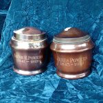 Brass urns containing the cremated remains of James Powers and his wife of 57 years, Irene. COURTESY PHOTO, Loretta-Marie Dimond