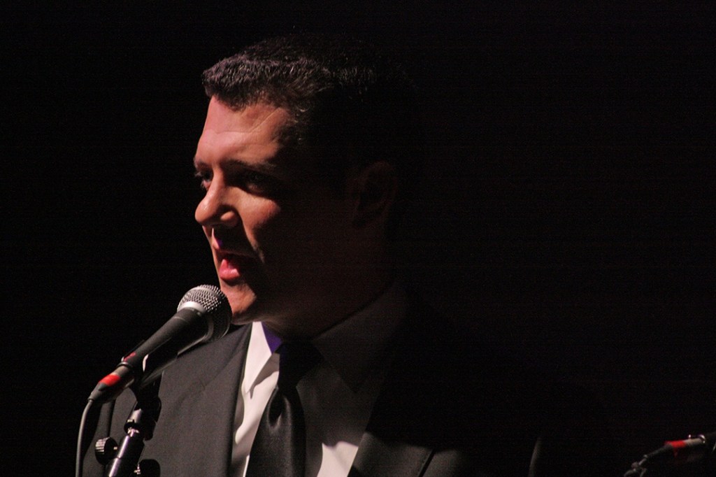 State Sen. Joe Fain, co-emcee, speaks to the audience at the Performing Arts Center. MARK KLAAS, Reporter