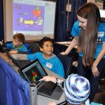 Teacher Allie Weber helps students use computers during last year&rsquo;s Tech Expo at the ShoWare Center. The event returns to the venue next Thursday, Jan. 19. HEIDI SANDERS, Kent Reporter