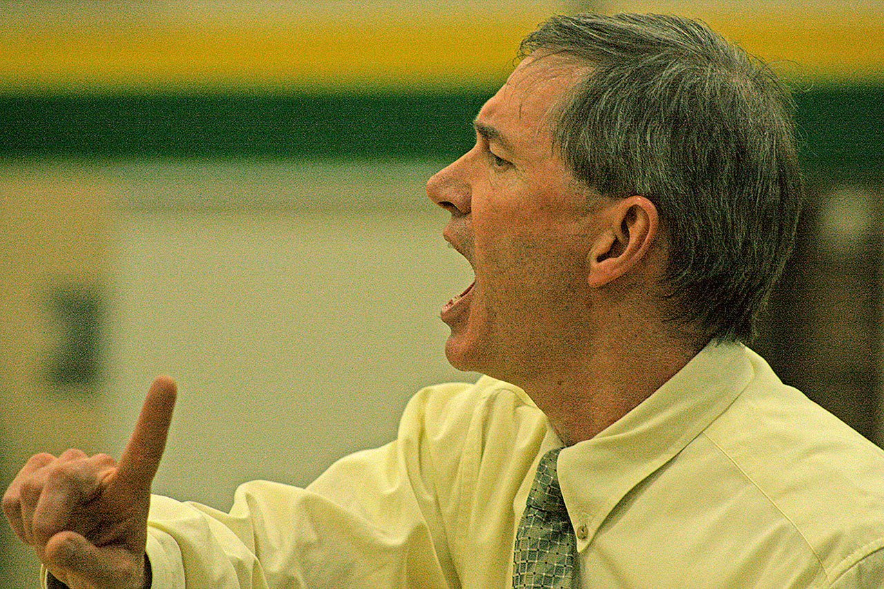 Kentridge coach Bob Sandall shouts instruction during the Chargers&rsquo; 50-33 home win against Kentlake last Friday night. The teams ended the regular season tied atop the NPSL Cascade Division, forcing a seeding game Tuesday. MARK KLAAS, Kent Reporter