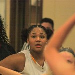 Kentridge&rsquo;s JaQuaya Miller looks to receive the ball down low as Kentlake&rsquo;s Aolani Calderon defends during NPSL Cascade Division play Friday night. MARK KLAAS, Kent Reporter