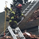 Firefighters extinguish Kent house fire