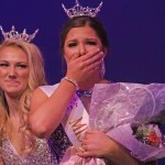 An emotional Elizabeth Enz, right, receives the crown from Jaclyn Seifert, 2016 Miss Auburn&rsquo;s Outstanding Teen. MARK KLAAS, Reporter