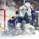 The Thunderbirds&rsquo; Ryan Gropp tries to handle the puck in front of the Americans&rsquo; goal during WHL play Sunday night at the ShoWare Center. COURTESY PHOTO, Brian Liesse/T-Birds