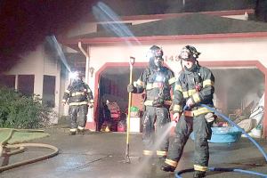 Firefighters extinguish Kent house fire