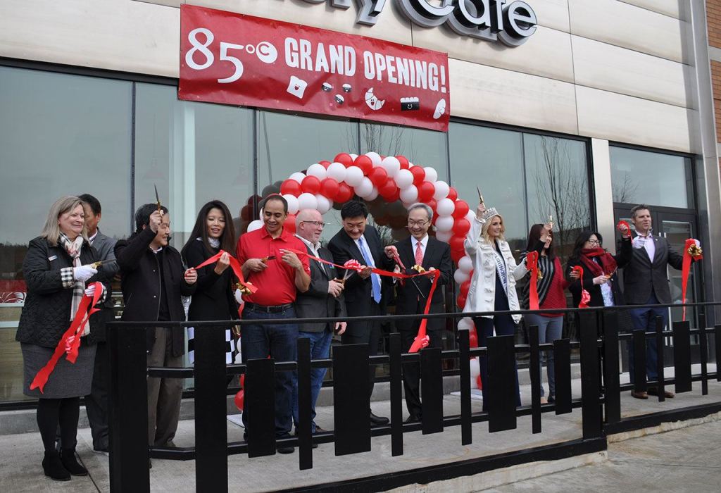 Tukwila city officials, community representatives and 85°C employees joined Alex Carlson Helo, Miss Washington USA 2017, for a ribbon cutting ceremony at 85°C Bakery Cafe. HEIDI SANDERS/Tukwila Reporter