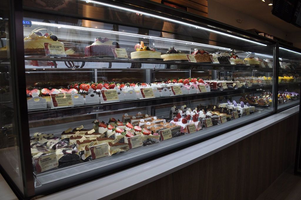 Desserts line a display case at 85°C Bakery Cafe. HEIDI SANDERS/Tukwila Reporter