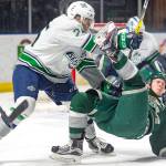The Thunderbirds&rsquo; Ethan Bear upends a Silvertip during WHL play Sunday evening. Seattle won 6-1 to clinch a playoff berth. COURTESY PHOTO, Brian Liesse/T-Birds